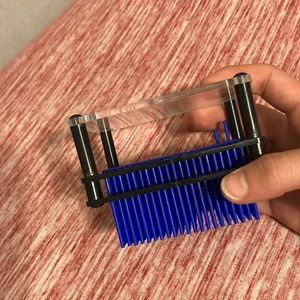 Mini fidget, blue, about 3 inches long, anxiety toy